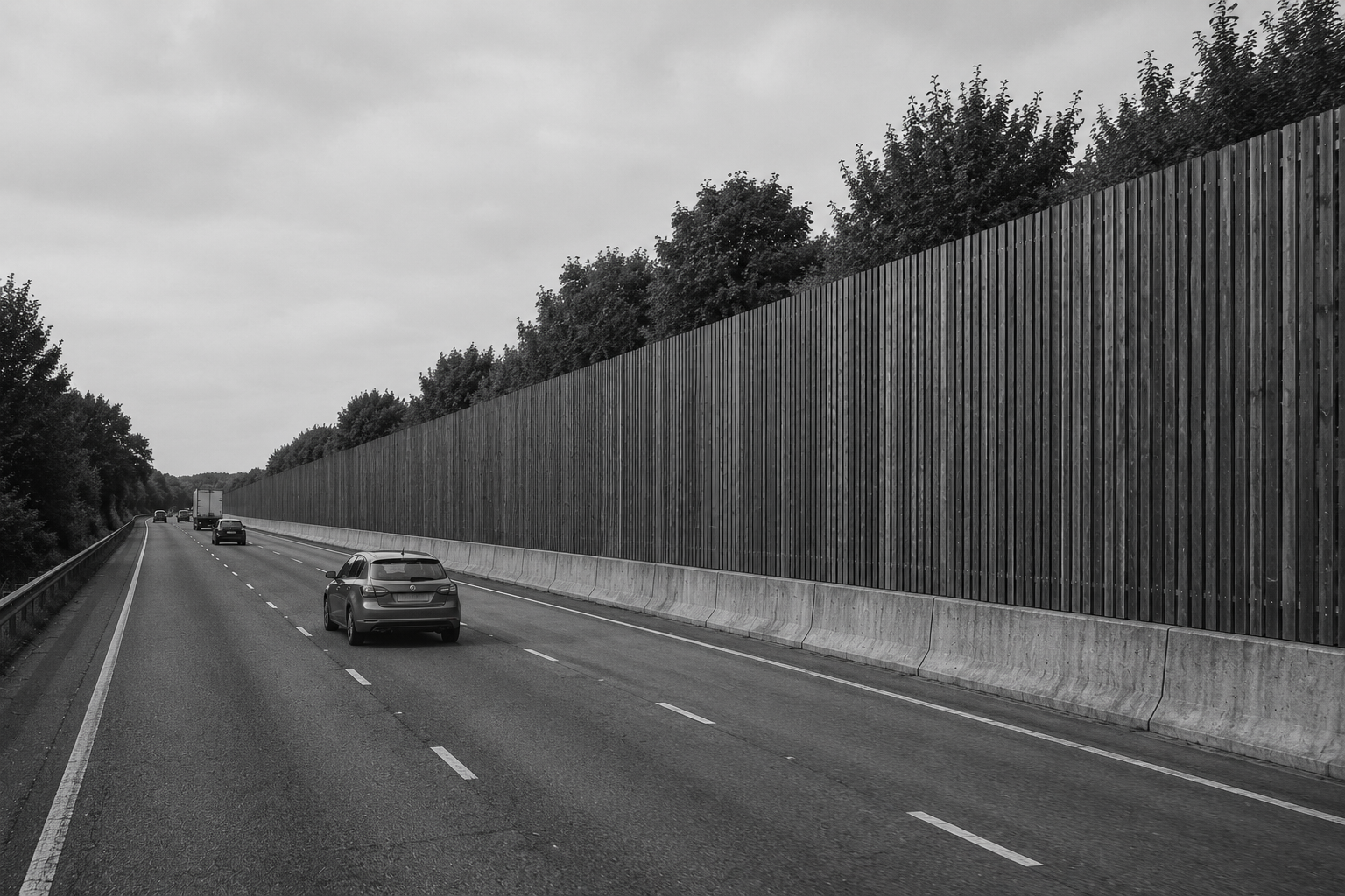 Traditional timber fencing installed beside motorway infrastructure